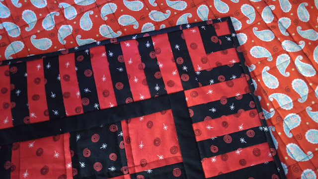 Red and black checkerboard checkers quilt