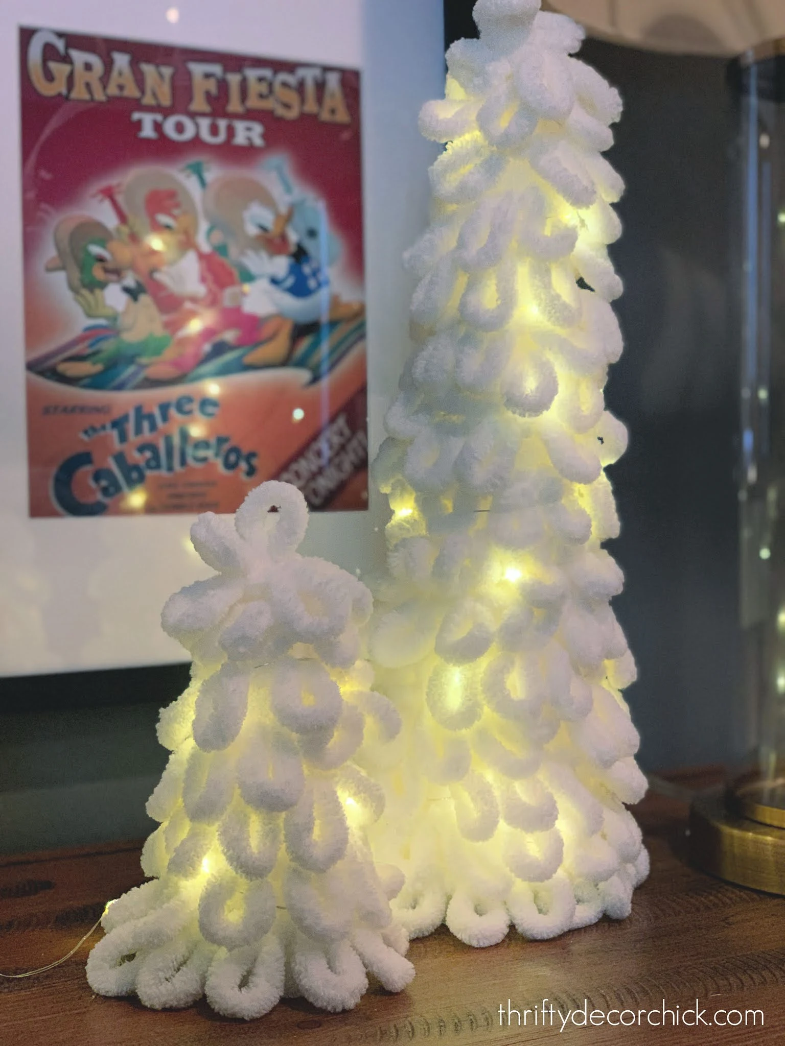 Twinkle lights inside foam yarn trees