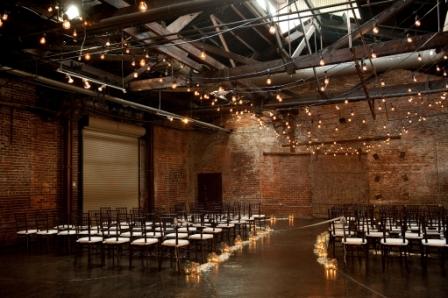 The aisle was lined with groupings of clear and antique blue mason jars with