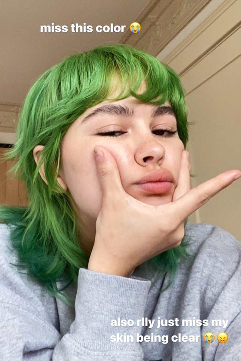 Enya Umanzor selfie with green carefree Shag hairstyle