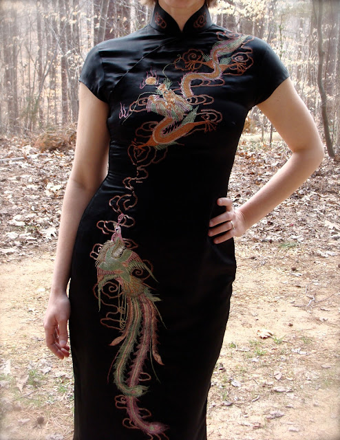 multi colored embroidery on silk satin Chinese body hugging dress and mandarin collar 