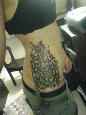 tattoo designs for girls upper back. hips and lower ack - GET,