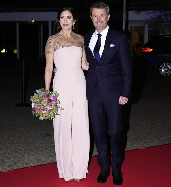 Crown Princess Mary wore a new wide-leg mesh jumpsuit by Stella McCartney. Gianvito Rossi pumps