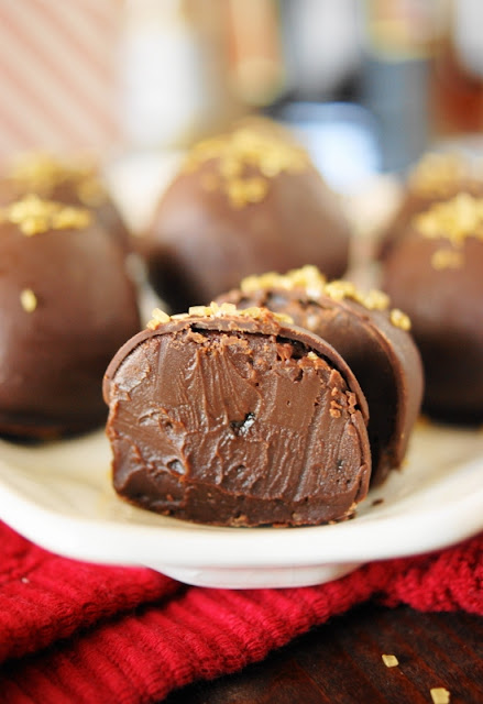 Biting into the creamy ganache center of these Kahlua Chocolate Truffles is pure chocolate bliss.  They're just the right indulgently delicious chocolate treat for the holidays or any time of the year!  www.thekitchenismyplayground.com