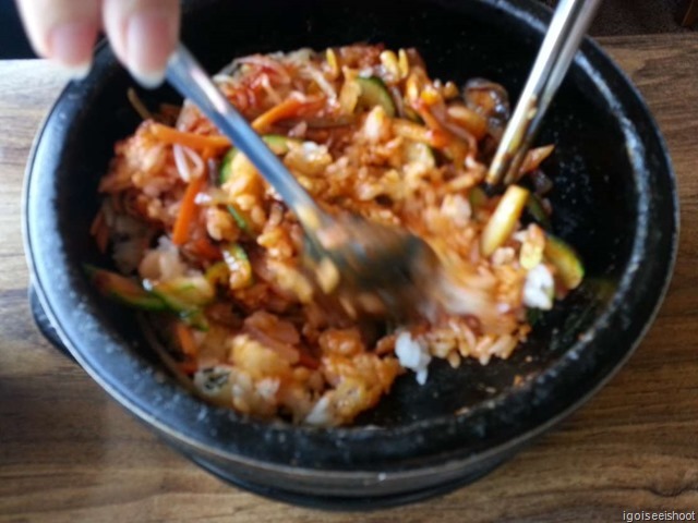 Restaurant near Changdeokgung - Bibimbap – stir and stir to mix the rice with meat and veggies well on the hot bowl.