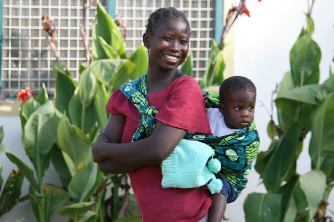 A caregiver and orphan at the Berega Orphanage