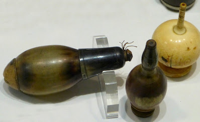 Horn and ivory powder bottles on display at the Science Museum, London