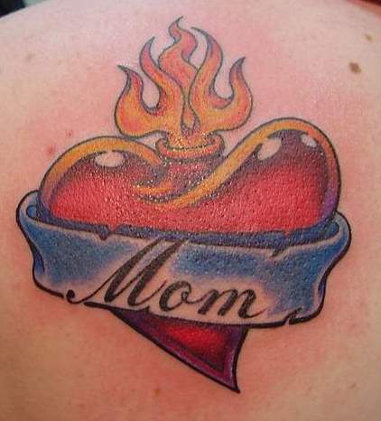 mom heart tattoo on his arm,