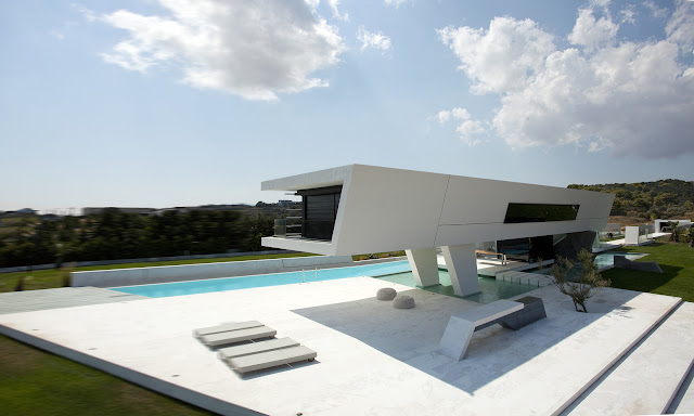 Picture of modern home with large terrace and swimming pool