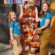 Image: Set up a Halloween candy tree on your porch and let kids safely take their own treats