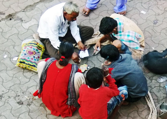 people gambling on streets