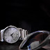 Silver analog watch