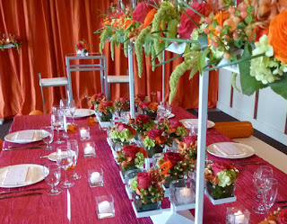 Orange and pink wedding decor at Woodmark Hotel - Photo by Patricia Stimac, Seattle Wedding Officiant