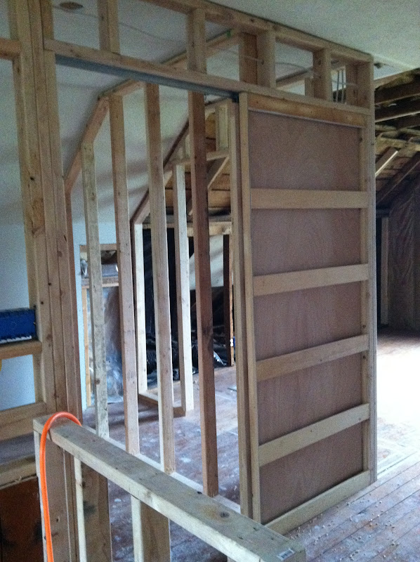 Pocket door to the master bath. (I am in love with pocket doors!)This  title=