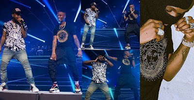 Wizkid wears mask, makes surprise appearance at Davido’s London Concert