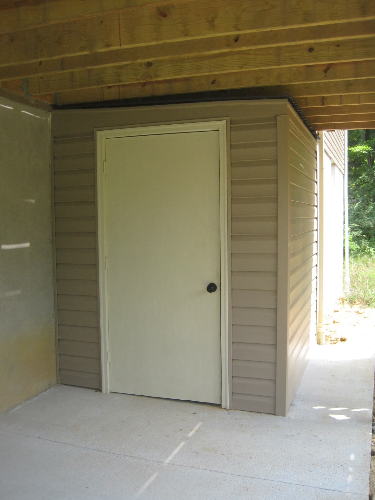 keep storage sheds off the ground - raising concrete