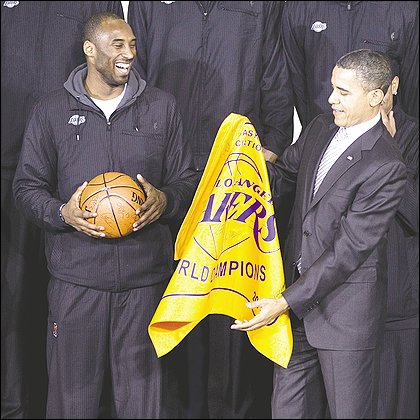 Los Angeles Lakers star Kobe Bryant enjoys watching President Obama inspect 