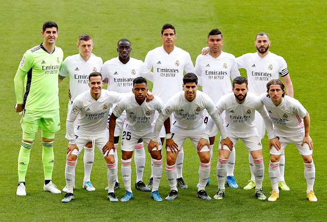 REAL MADRID C. F. Temporada 2020-21. Courtois, Toni Kroos, Mendy, Varane, Casemiro, Benzema. Lucas Vázquez, Rodrygo, Marco Asensio, Nacho y Modric. CLUB ATLÉTICO DE MADRID 1 🆚 REAL MADRID C. F. 1. Domingo 07/03/2021, 16:15 horas. Campeonato de Liga de 1ª División, jornada 26. Madrid, estadio Wanda-Metropolitano, sin público. GOLES: ⚽1-0: 15’, Luis Suárez. ⚽1-1: 88’, Karim Benzema.