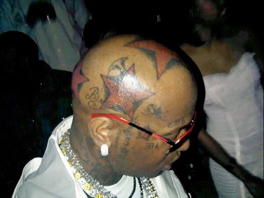 Birdman Head Tattoos. American rapper and record executive, Birdman,