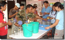 Trainees prepare larval food