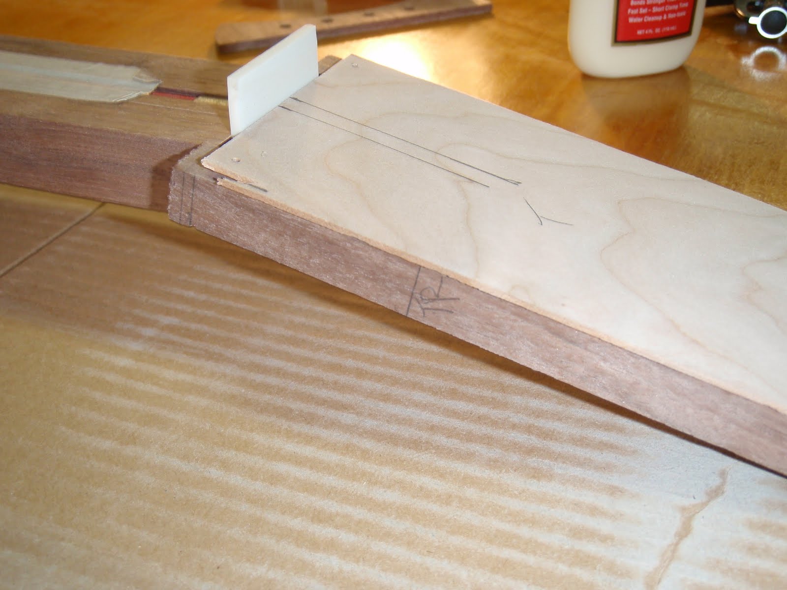 applying a clamp to wood veneer