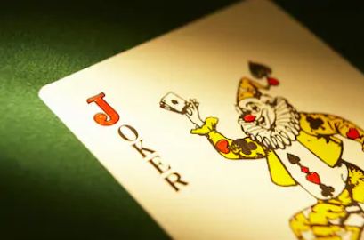 why joker is used in playing cards, joker in poker, deck of cards, how joker card was invented, why do playing cards have jokers, joker card meaning, what is the purpose of the joker card, joker card symbol, deck cards