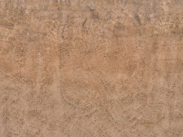 Stucco brown wash wall texture