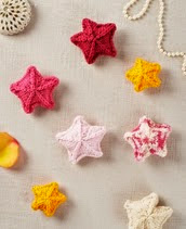 http://www.letsknit.co.uk/free-knitting-patterns/scattering-of-stars