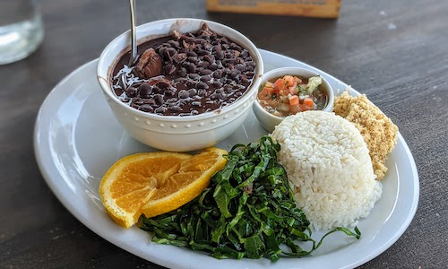 Feijoada plate with all the accoutrement