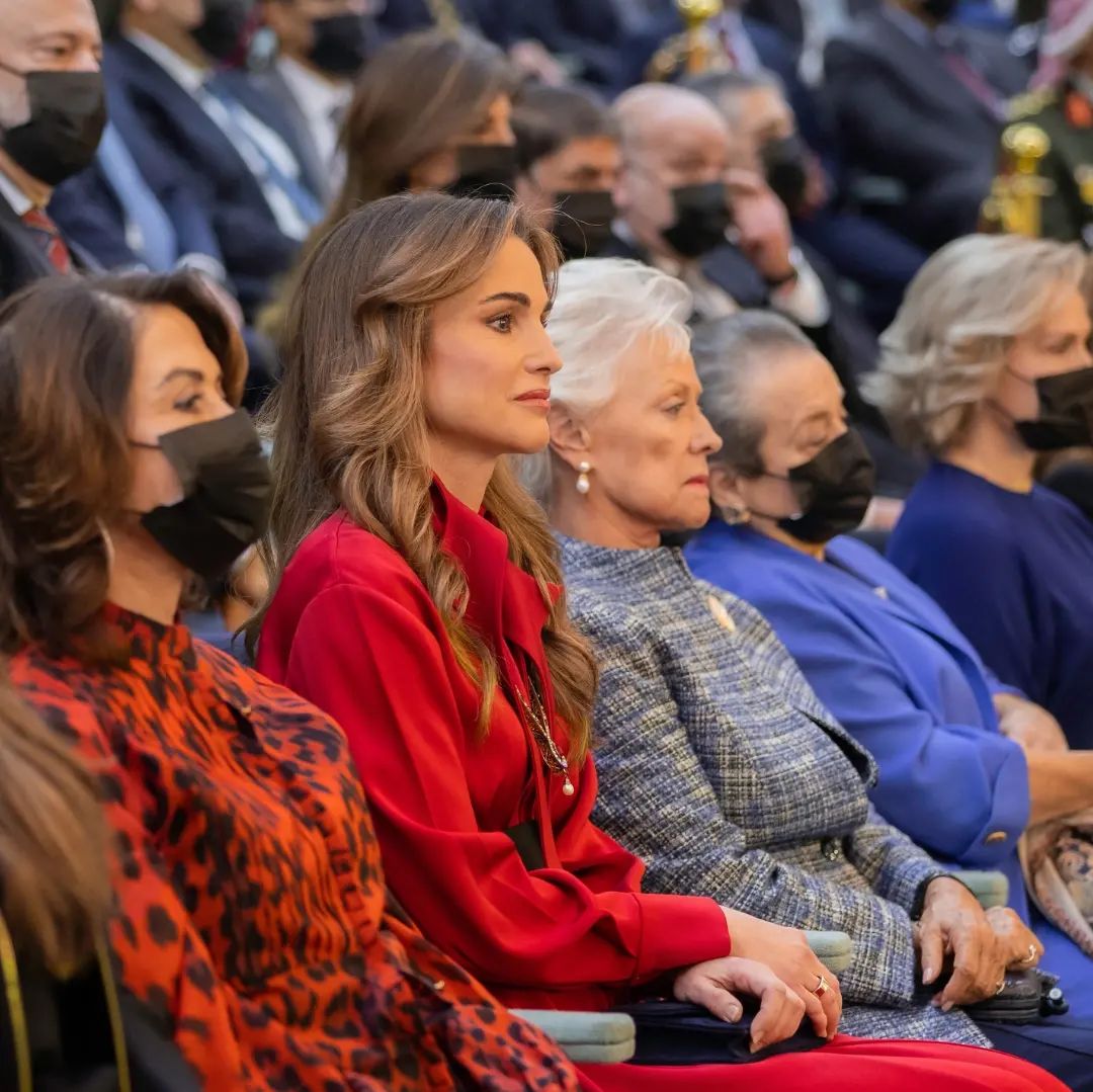 Queen Rania of Jordan wore her Hussein Bazzaza Amal Red Dress with black Jennifer Chamandi suede pumps and LE-8 Gold Buckle suede bag at the Parliament Opening