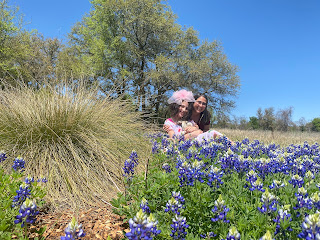 Olivia Denbina and Olive's mom enjoying the Texas bluebonnets.