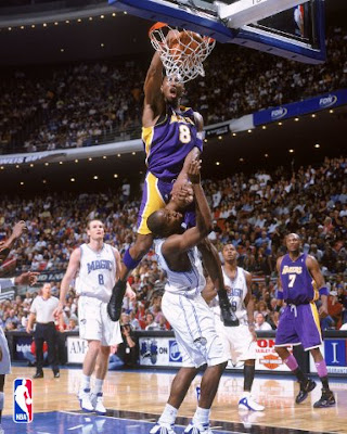 kobe bryant and lebron james dunk. lebron james dunking on kobe.