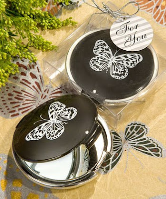 May we suggest the following butterfly themed wedding favors and ideas