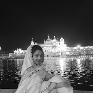 Mehreen Pirzada in White Dress with Cute Smile at Golden Temple