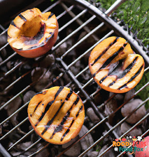 Grilled Peach halves on the grill