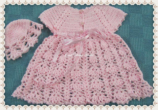 a cute baby dress layette set - free crochet pattern info from Sweet Nothings Crochet