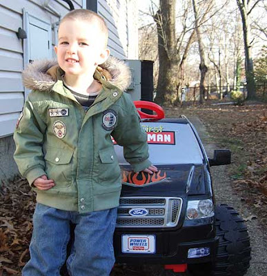 Brae loves his new truck.