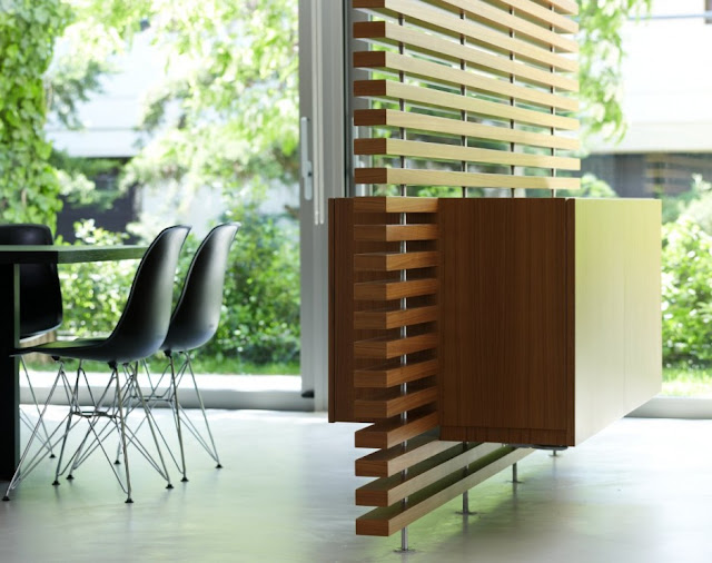 Wooden walls between kitchen and dining room 