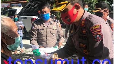 Polres Samosir Bakti Sosial dan Berbagi Tali Asih Kepada Warga Desa Bobo Terdampak Covid-19