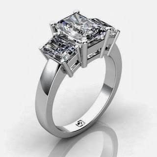 Palladium This Past Present and Future Ring for Radiant Cut Diamonds uses basket style settings to showcase the diamond's brilliance.