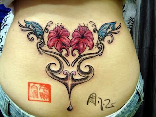 Girly Flower Butterflies and Tribal Tattoo Design on Lower back