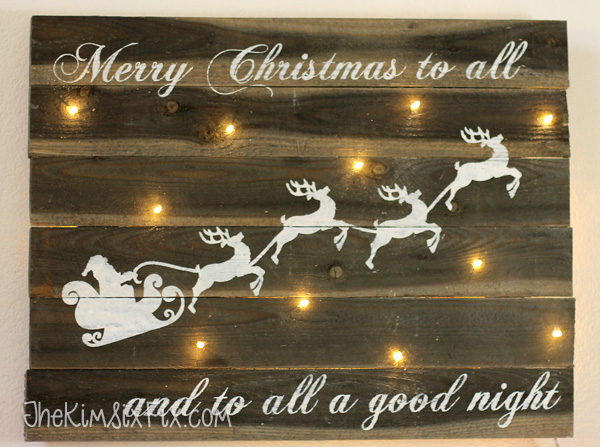 Reclaimed barn wood sign with christmas lights