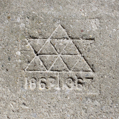 Sidewalk contractor's stamp, with the 1867-1967 Centennial logo