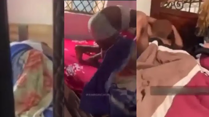 “Shameless mother” – Video trends online as lady caught her mum sleeping with her boyfriend, gets aggressive under the duvet (Watch)