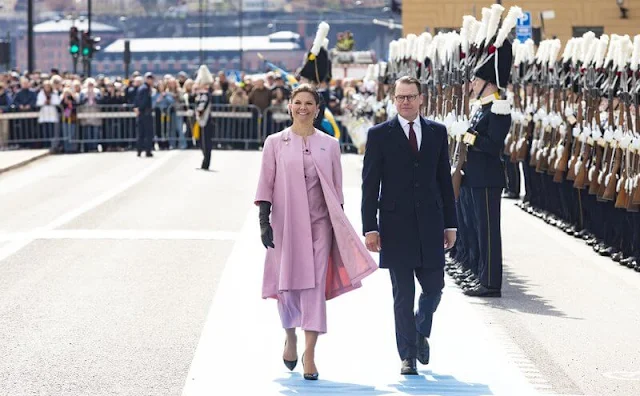 Crown Princess Victoria is wearing designer Christer Lindarw pink outfit, coat and dress, and headpiece