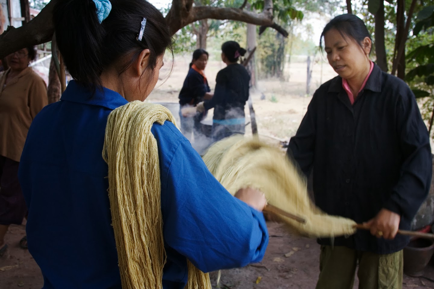 TAMMACHAT works with natural dyers like this member of Prae Pan weaving co-operative to help preserve local dye knowledge and to create eco-friendly textiles that are safe for their makers' health and their environments.