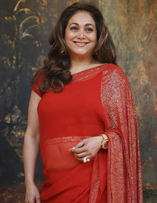 tina_ambani_in_red_sari_FilmyFun.blogspot.com