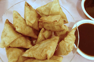 "Samosas and chutney 2009" by Dave Haygarth - Flickr: The best Samosas in the world. Licensed under CC BY 2.0 via Wikimedia Commons - https://commons.wikimedia.org/wiki/File:Samosas_and_chutney_2009.jpg#/media/File:Samosas_and_chutney_2009.jpg