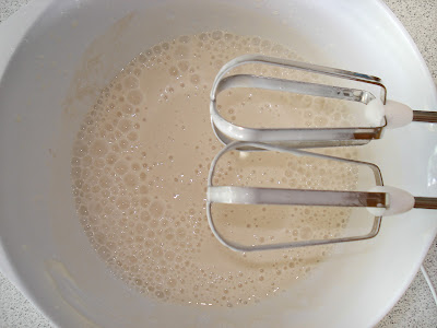 Whisk the frozen yogurt with a hand whisk