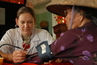 Doctor Checking Up Patient in Urban Area